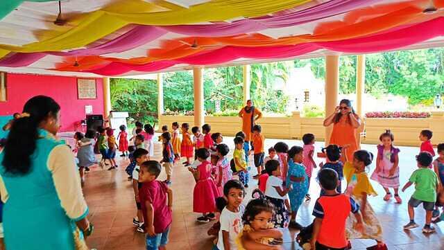 Children dancing in resort 