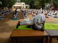 21.Halasana Yoga Pose